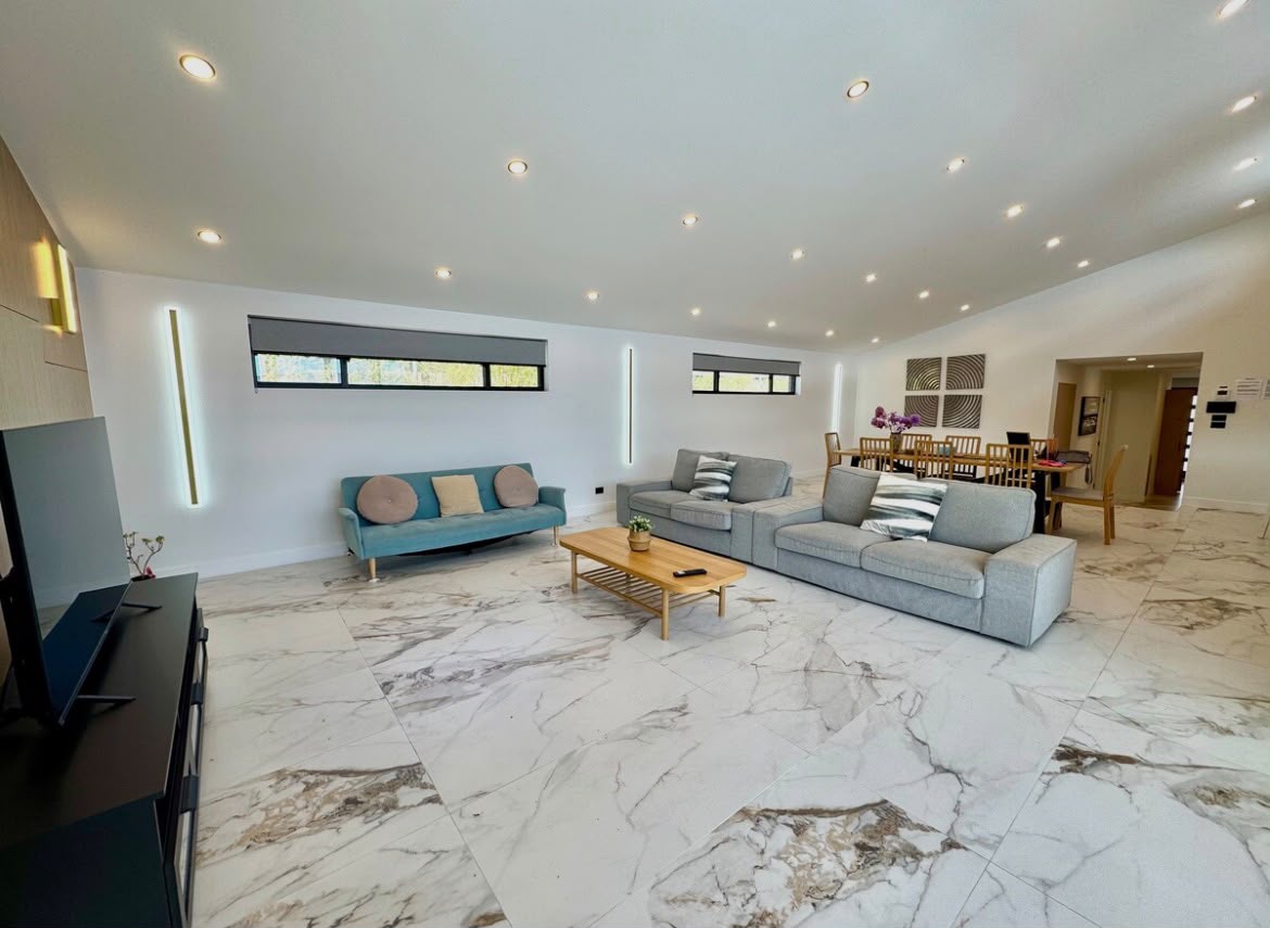 Gold-veined marble open living area