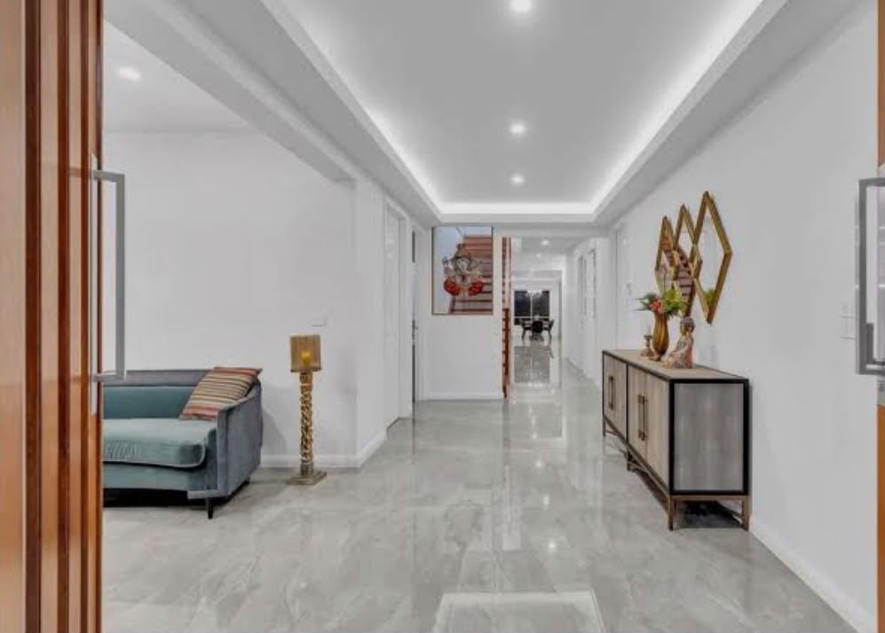 Grey-veined polished marble hallway